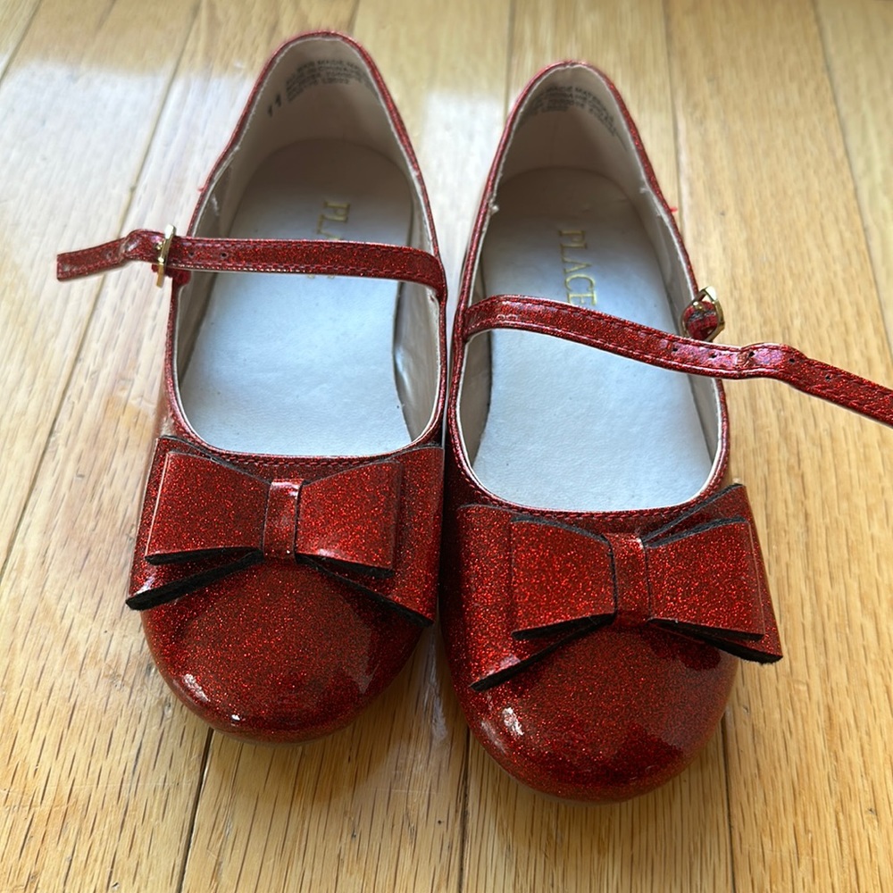 Children place red shoes worn handful of times no scratches that I can see